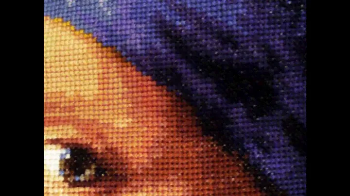 Girl with a Pearl Earring by Johannes Vermeer. Cross-stitching by Marusya Jermi